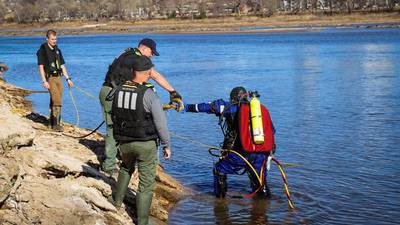 Tulsa Police Dive Team pulled a car out of the Arkansas River on Dec. 28.