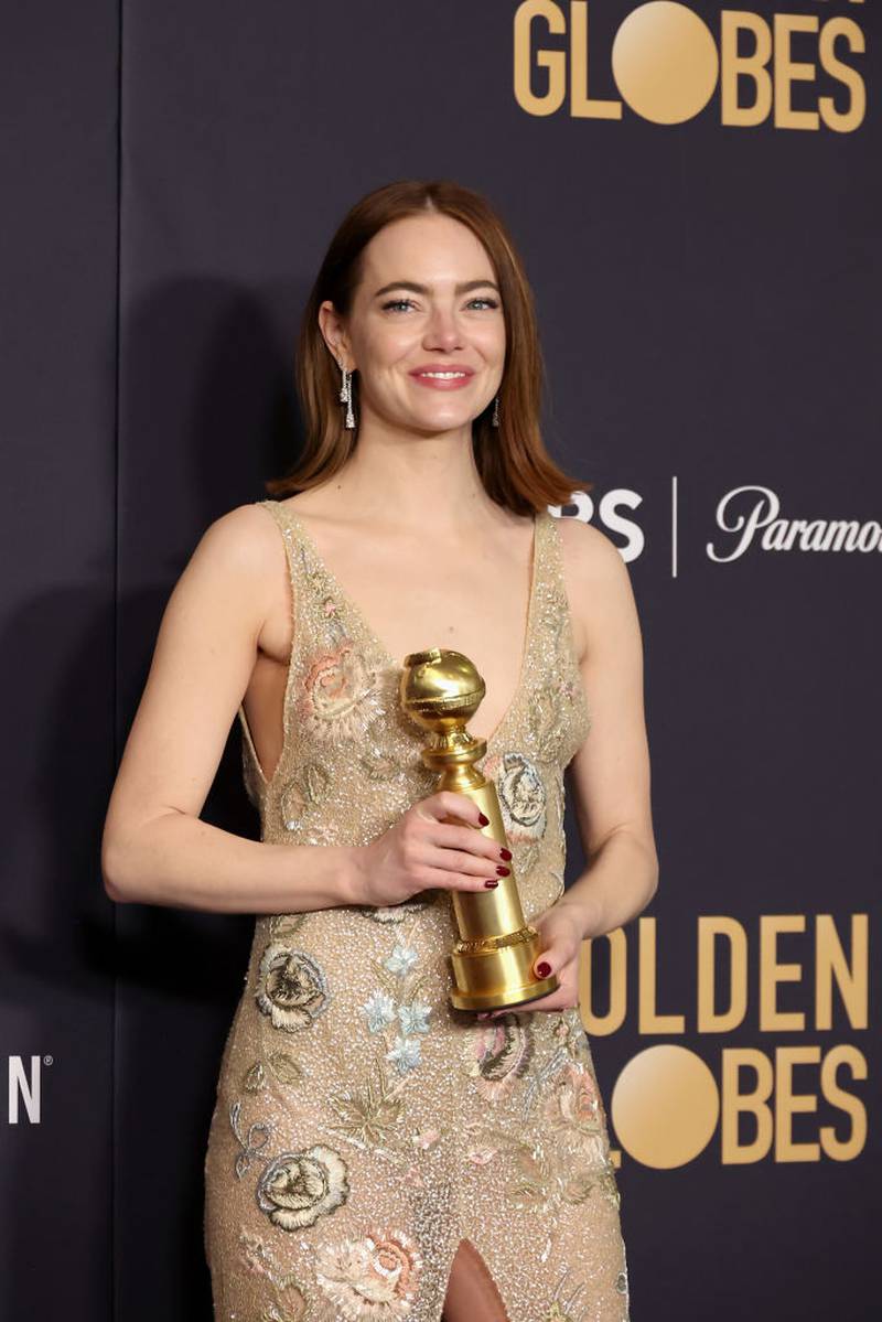 BEVERLY HILLS, CALIFORNIA - JANUARY 07: Emma Stone, winner of the Best Performance by an Actress in a Motion Picture, Musical or Comedy award for "Poor Things" poses in the press room during the 81st Annual Golden Globe Awards at The Beverly Hilton on January 07, 2024 in Beverly Hills, California. (Photo by Amy Sussman/Getty Images)