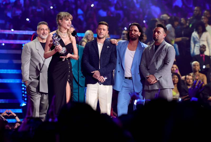 NEWARK, NEW JERSEY - SEPTEMBER 12: Taylor Swift (2nd L) accepts the Best Pop award for "Anti-Hero" from (from L) Joey Fatone, Justin Timberlake, JC Chasez, and Chris Kirkpatrick of *NSYNC onstage the 2023 MTV Video Music Awards at Prudential Center on September 12, 2023 in Newark, New Jersey. (Photo by Theo Wargo/Getty Images for MTV)
