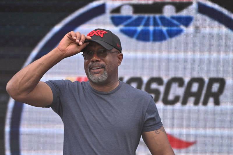 AUSTIN, TEXAS - MARCH 26:  Musician Darius Rucker walks onstage during pre-race ceremonies prior to the NASCAR Cup Series EchoPark Automotive Grand Prix at Circuit of The Americas on March 26, 2023 in Austin, Texas. (Photo by Logan Riely/Getty Images)
