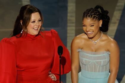 HOLLYWOOD, CALIFORNIA - MARCH 12: (L-R) Melissa McCarthy and Halle Bailey speak onstage during the 95th Annual Academy Awards at Dolby Theatre on March 12, 2023 in Hollywood, California. (Photo by Kevin Winter/Getty Images)